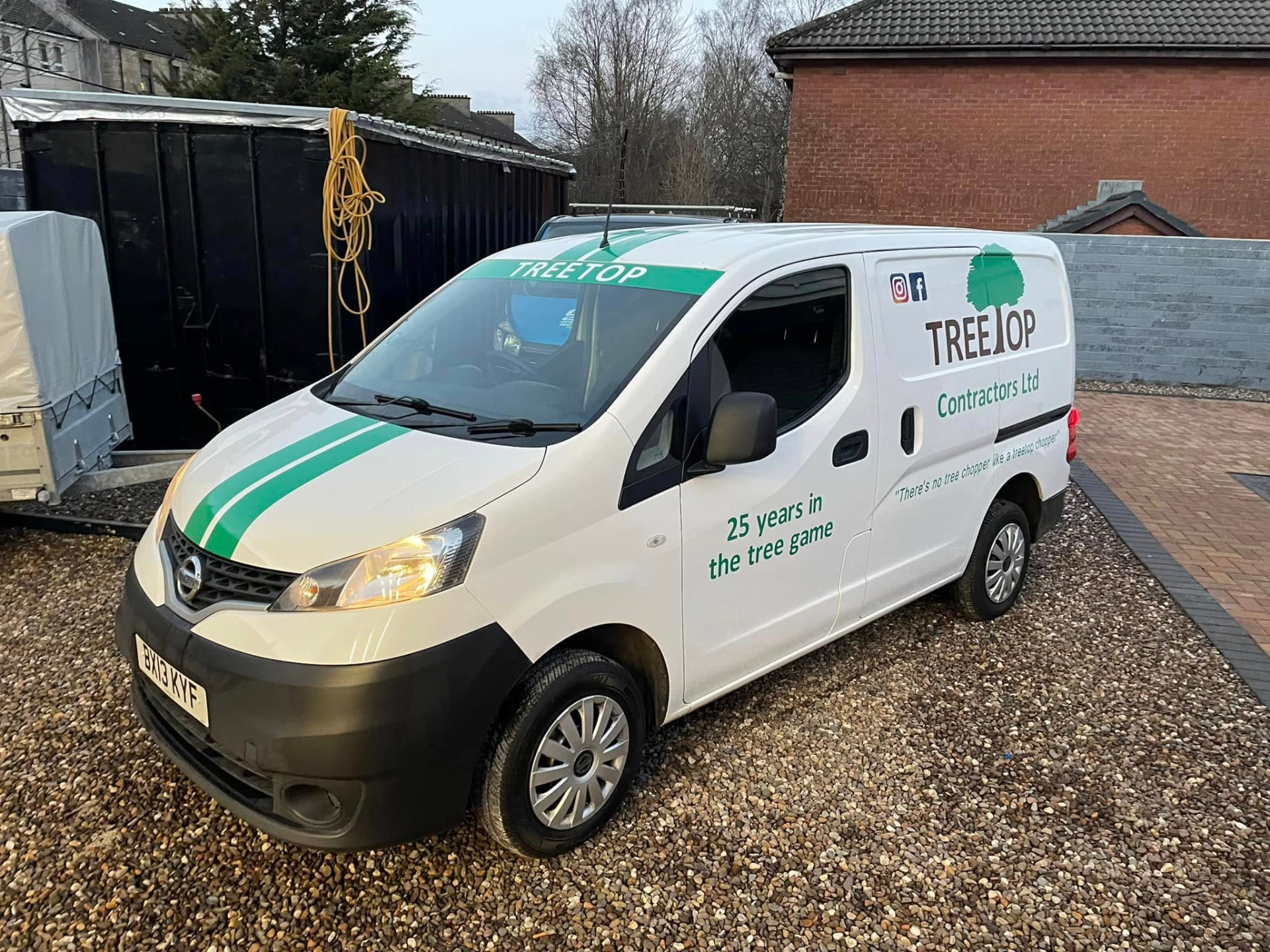 Treetop Contractors branded van on a domestic driveway